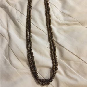 Copper toned long beaded strand
